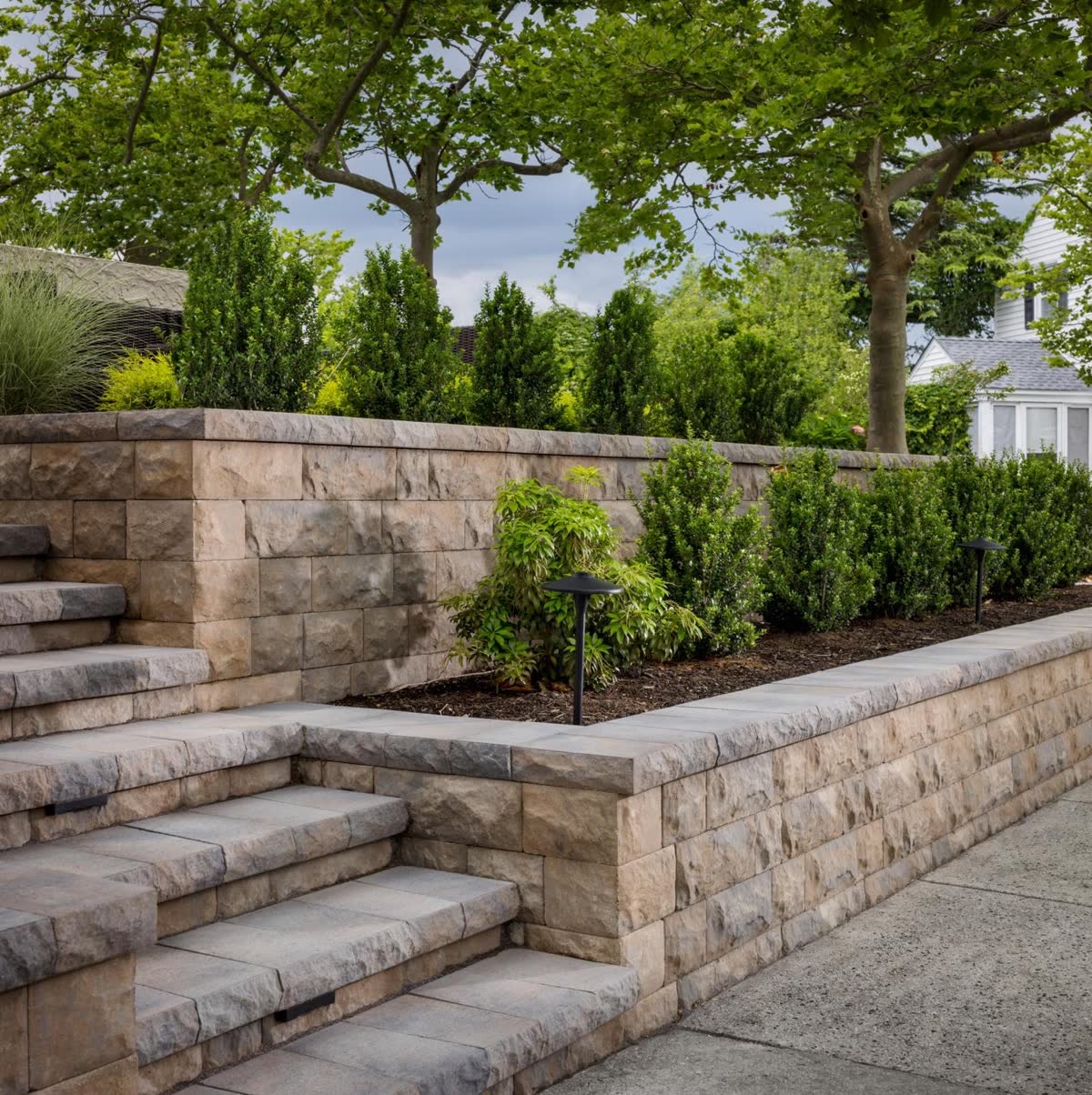 GOAT Hardscape retaining wall and garden design in Needham, Massachusetts